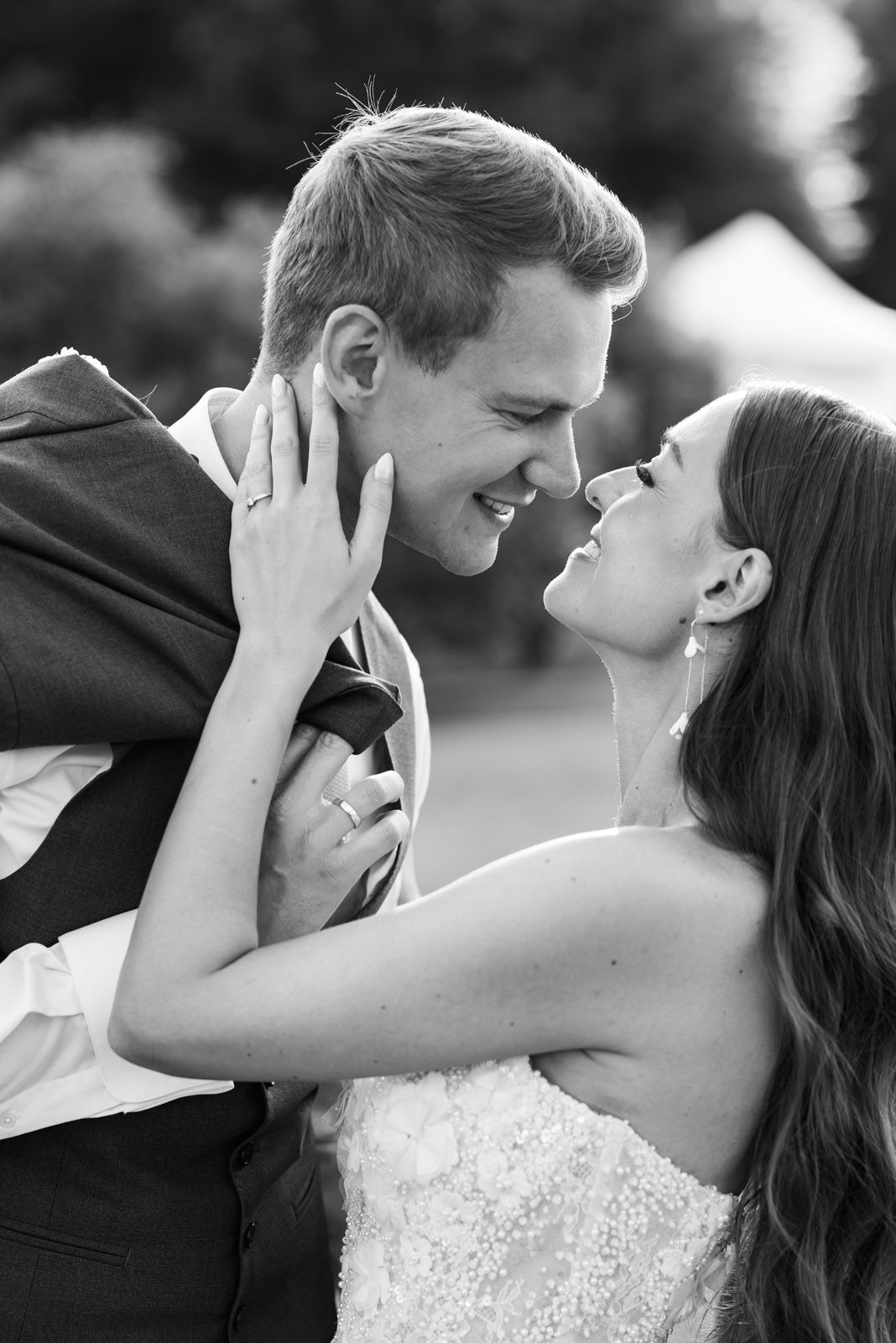 Nadine and Nick a breath away from a kiss, black and white close-up